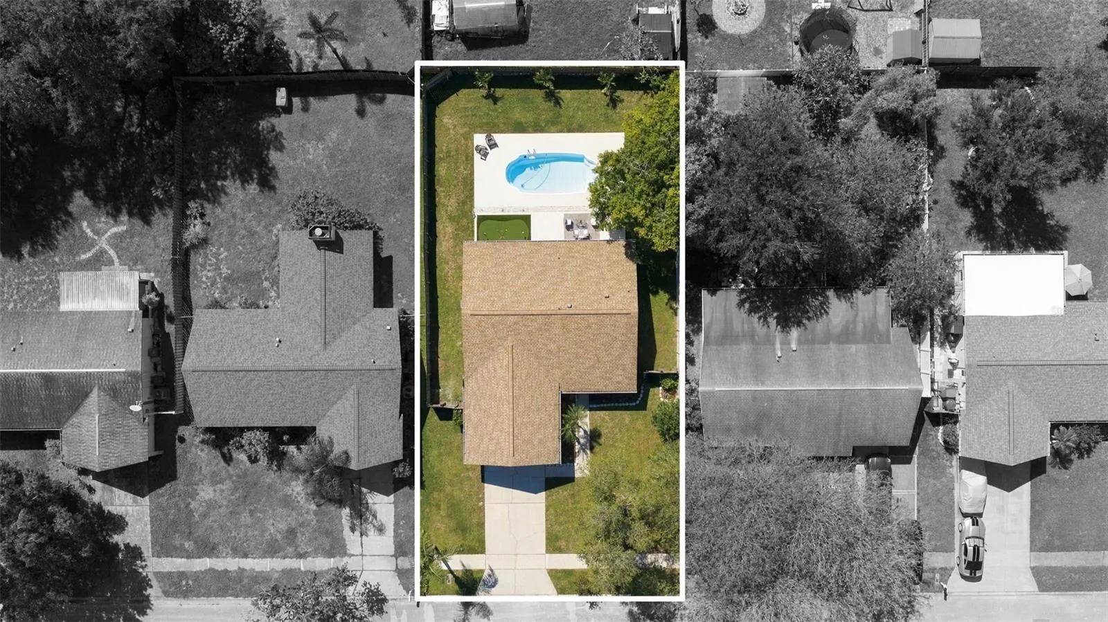 Aerial showing large fenced yard