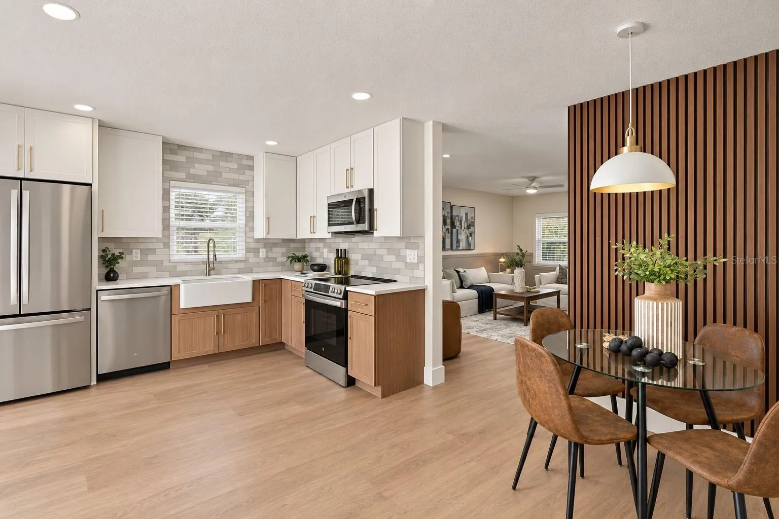 Dinette space with acoustic paneling and modern pendant light