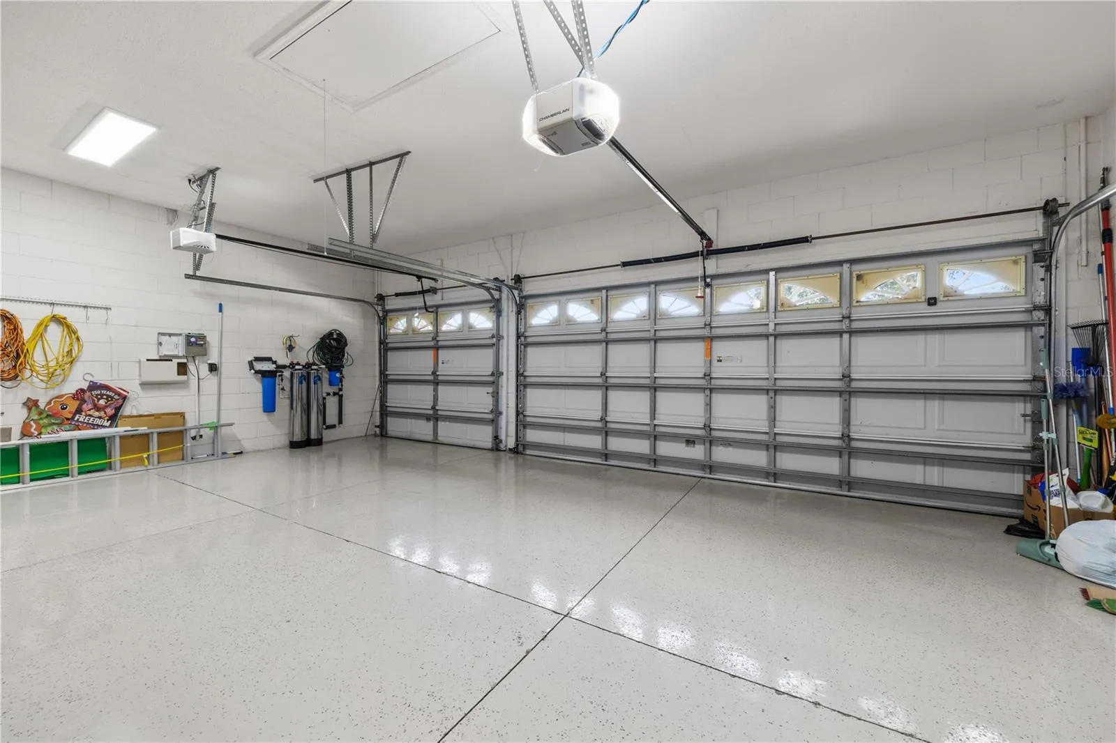 3 car garage with epoxy flooring