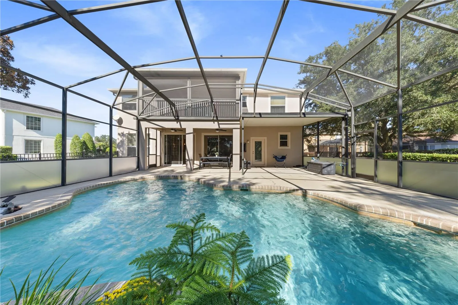 Custom-designed saltwater pool with a beautiful rock waterfal