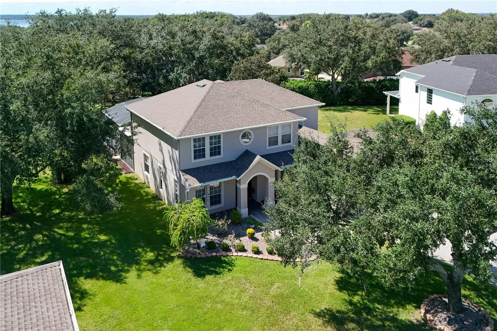 Beautifully landscaped grounds with mature magnolia trees