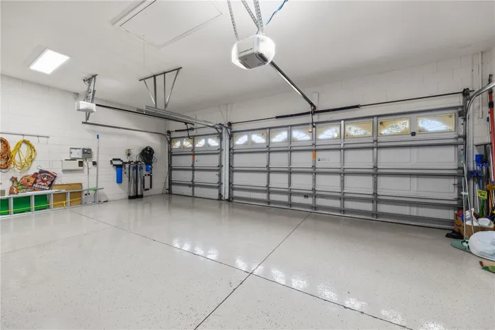 3 car garage with epoxy flooring