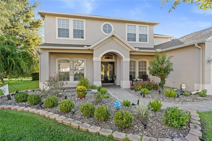 Beautifully landscaped grounds with mature magnolia trees
