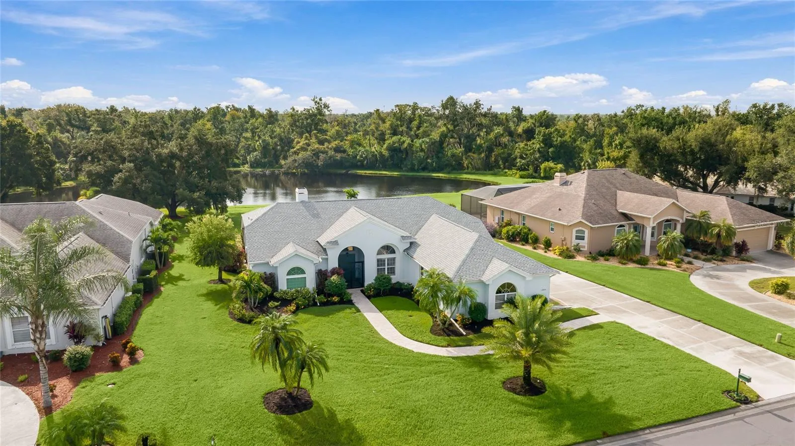 Amazing lake views with mature landscaping, set against a certified nature preserve.
