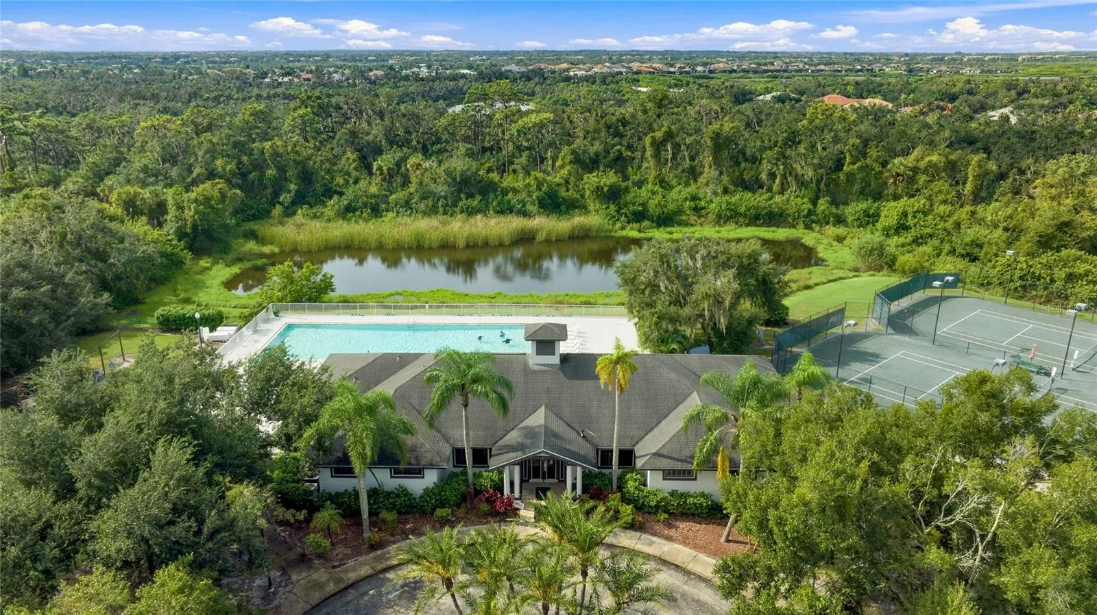 The Club at River Wilderness pool and tennis center