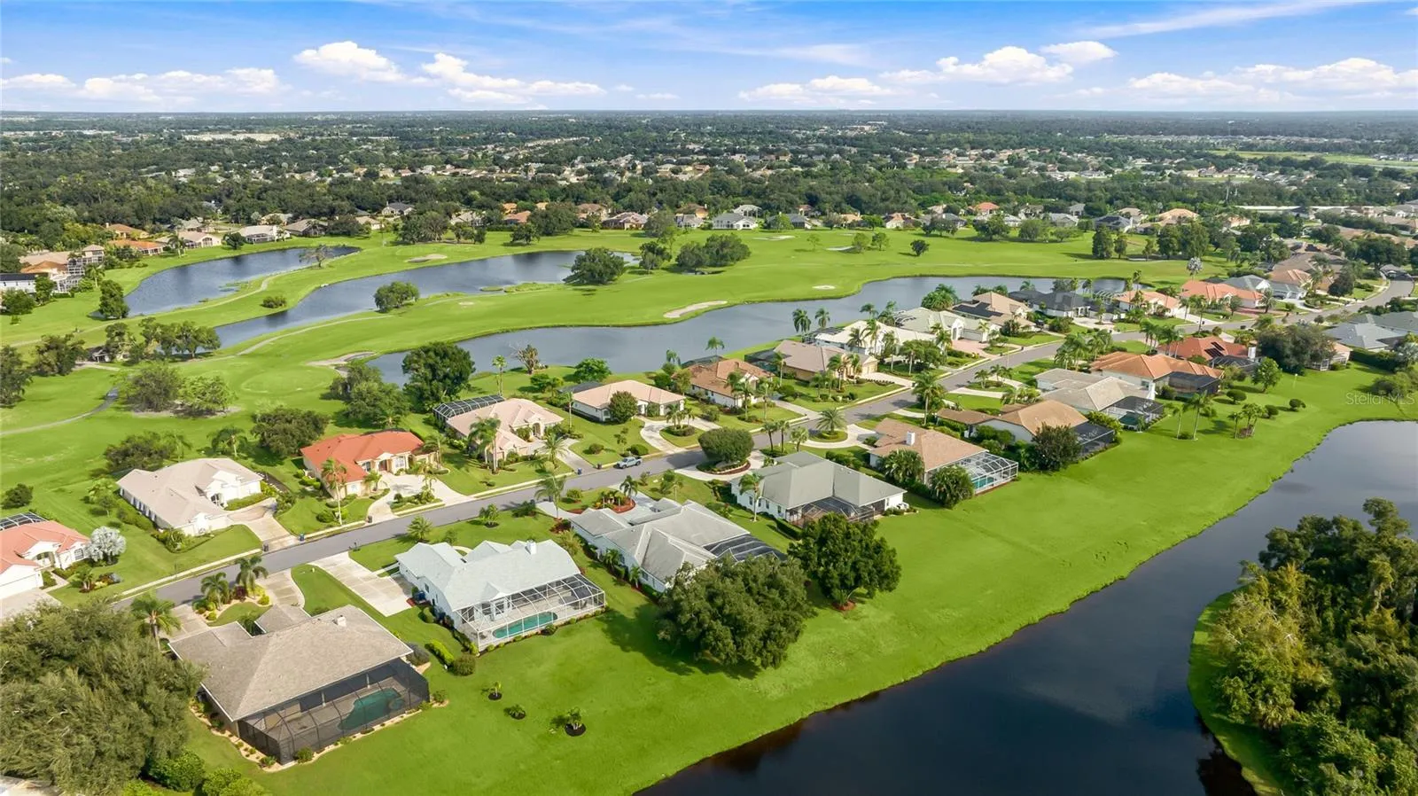Lake views and close to an optional golf course with club membership, Florida living at it's finest!