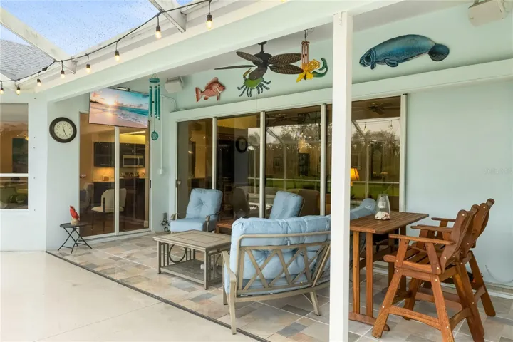 Entertain on the patio or watch the game on the wall mounted TV