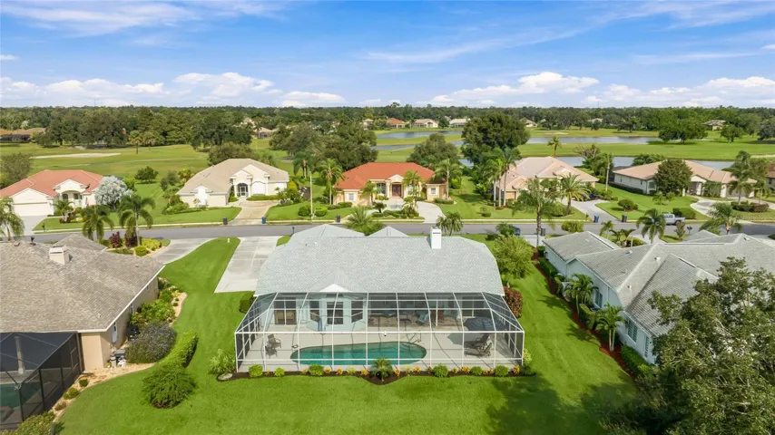 Screened in pool and lanai with lake views!