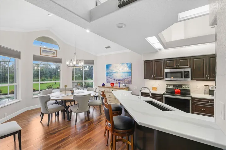 Enjoy mealtime at the built-in breakfast bar and designated dining area with a private lake view!