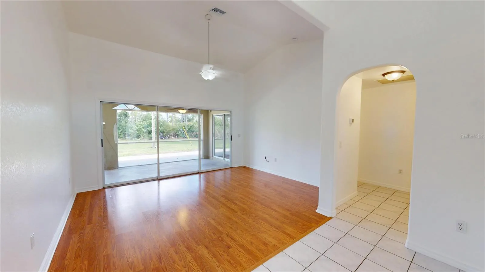 Split floor plan with the main bedroom off the living room.