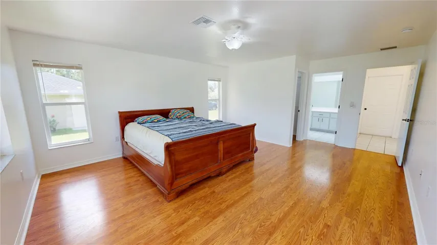 Main bedroom separate from the other 2 bedrooms and has a walk in closet and full bath.