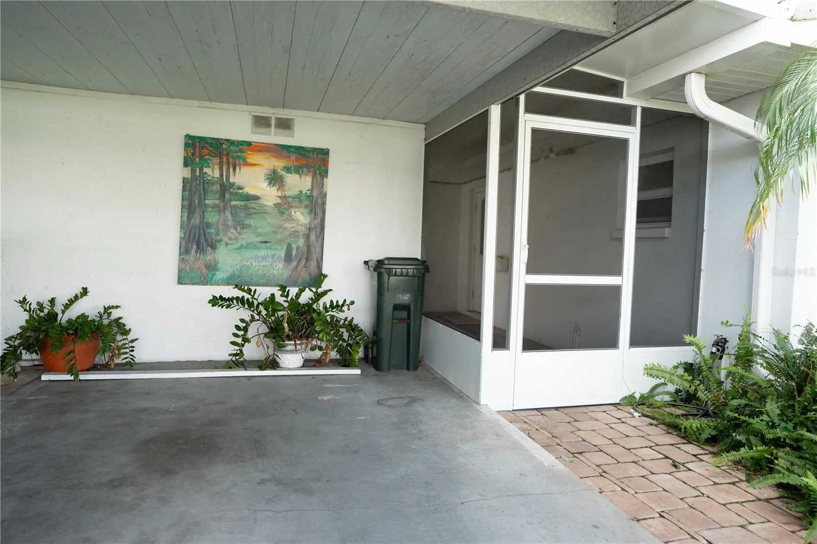 Carport and front porch.