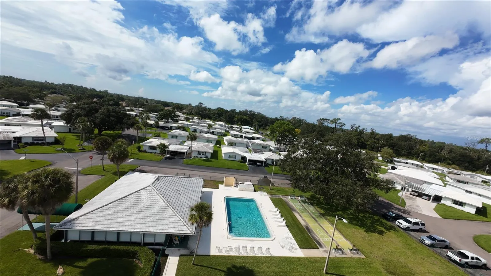 Community pool, recreation hall, and shuffle board court