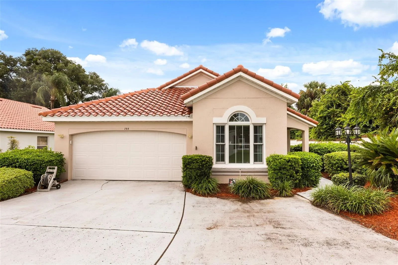 Extra space for parking, landscaping is done by HOA and a brand new tile roof