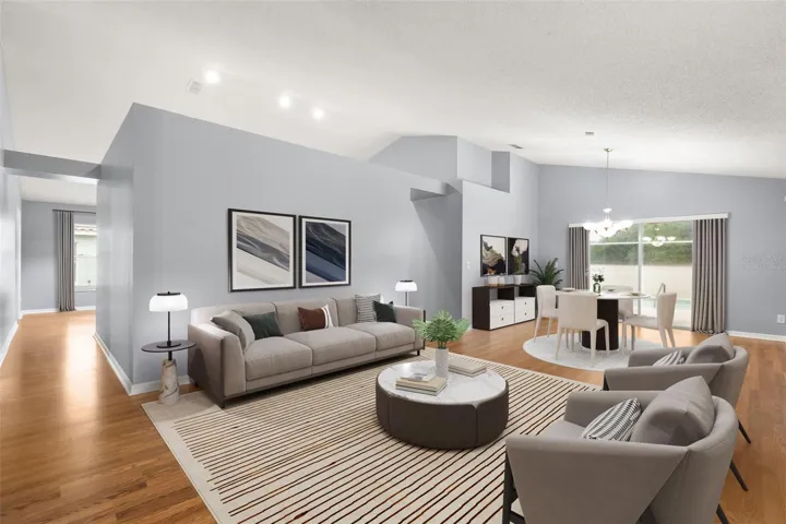 Virtually staged living and dining room and view from your front entry