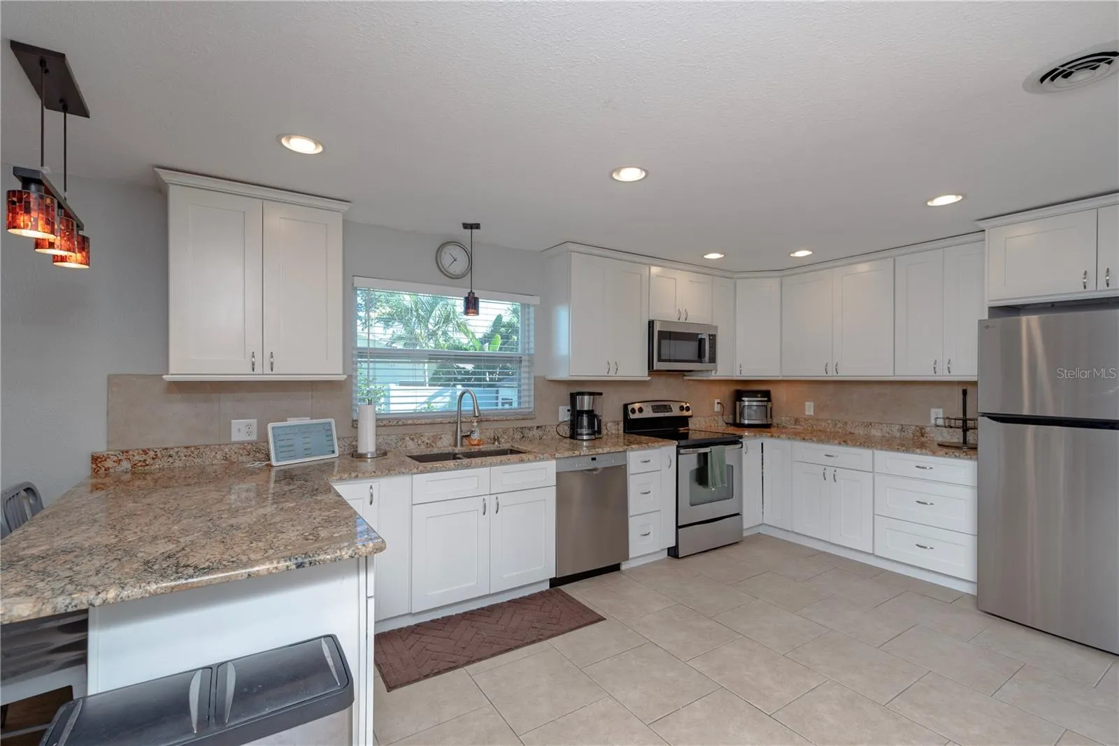 Granite counters and stainless steel appliances.