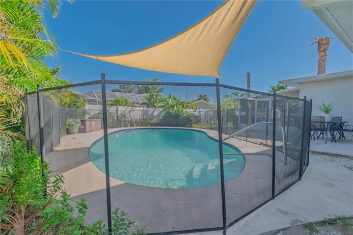 Pool with safety fence.