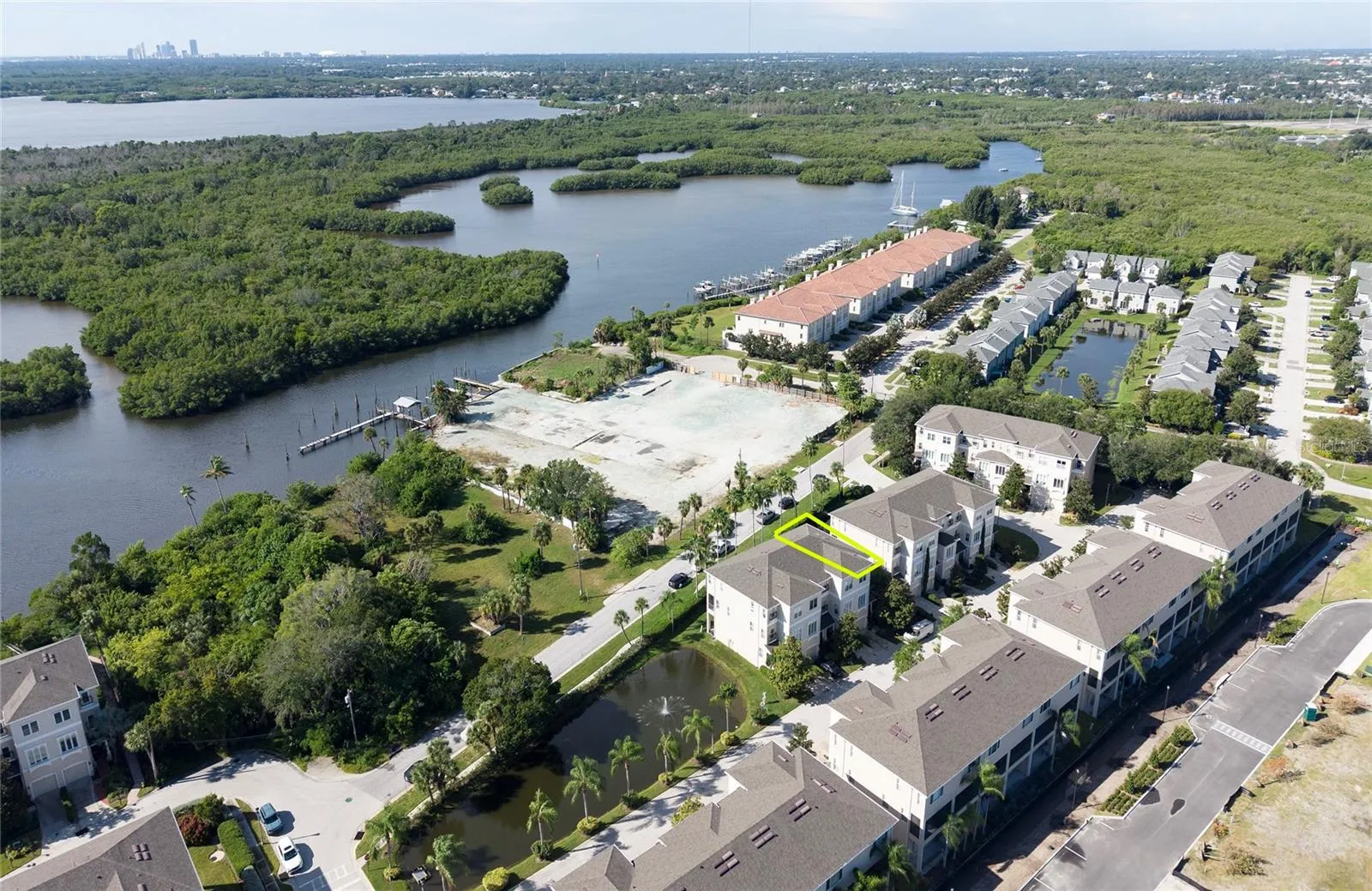 This corner townhome has a view of the water and Weedon Island.