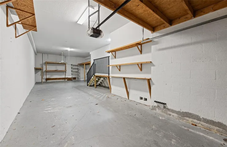 lots of built in storage in 3 car garage