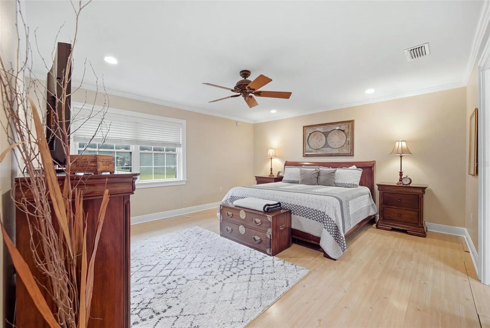 Primary bedroom features 2 walk in closets