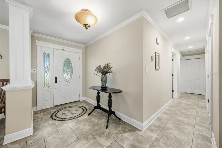Hallway leads to 3 bedrooms and 2 baths.  Primary suite on opposite side of house.