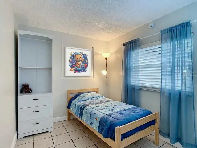 Virtually staged 3rd bedroom.