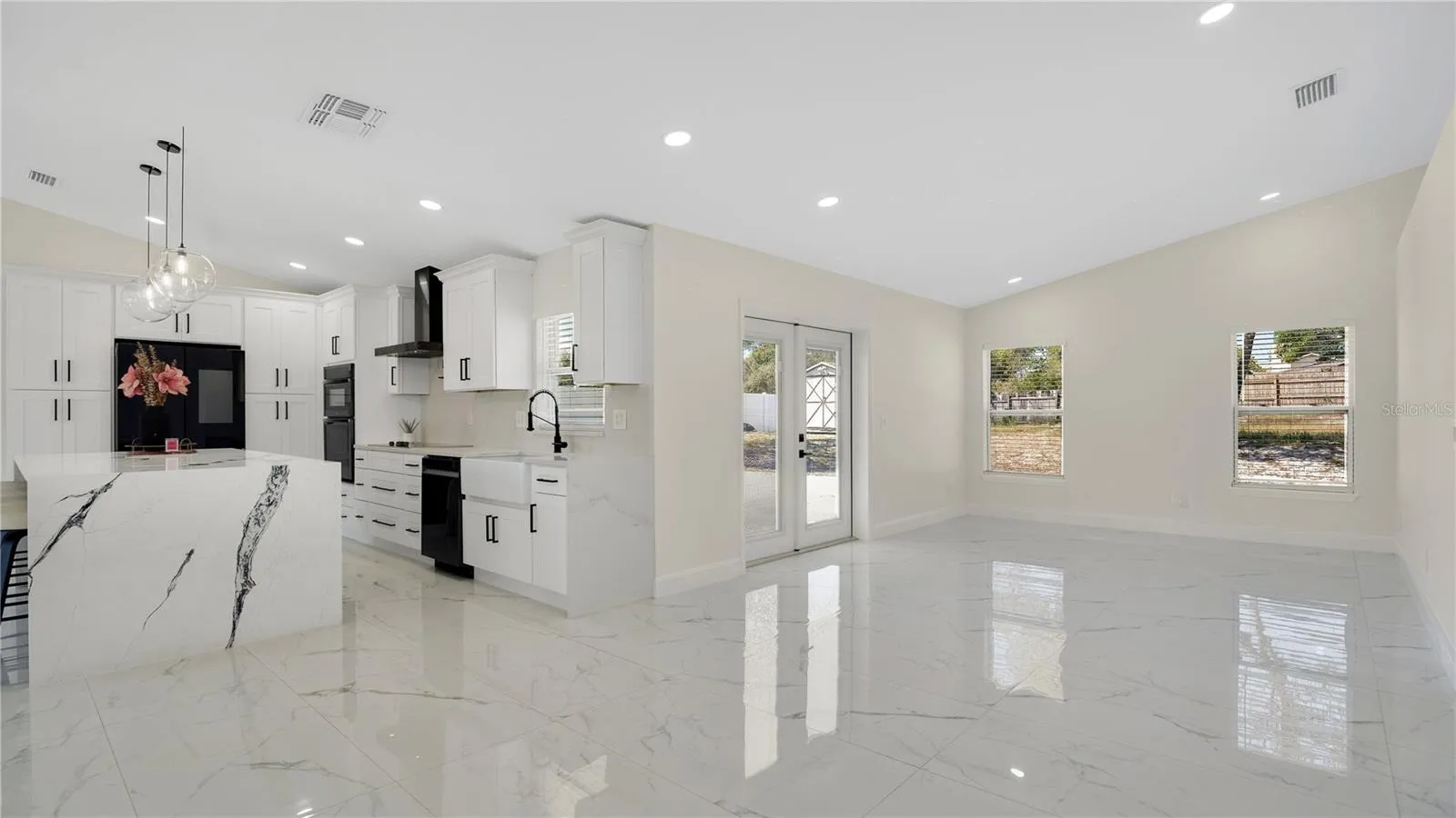 Open living area with vaulted ceilings