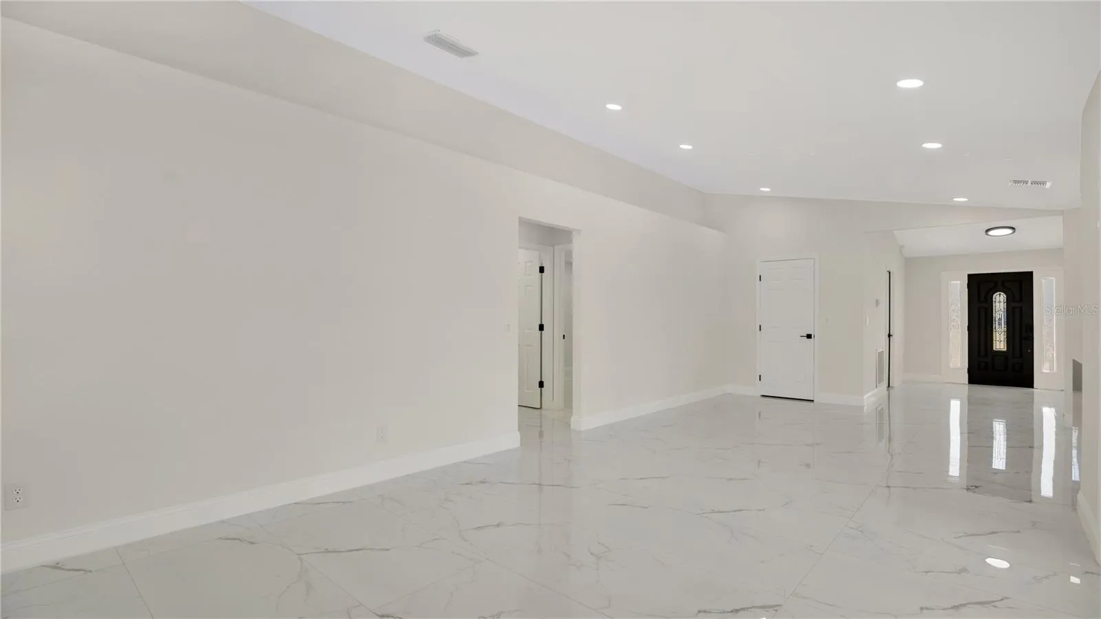 Entry foyer with tile flooring