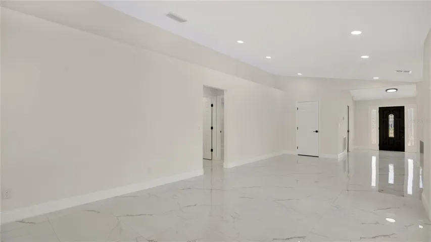 Entry foyer with tile flooring