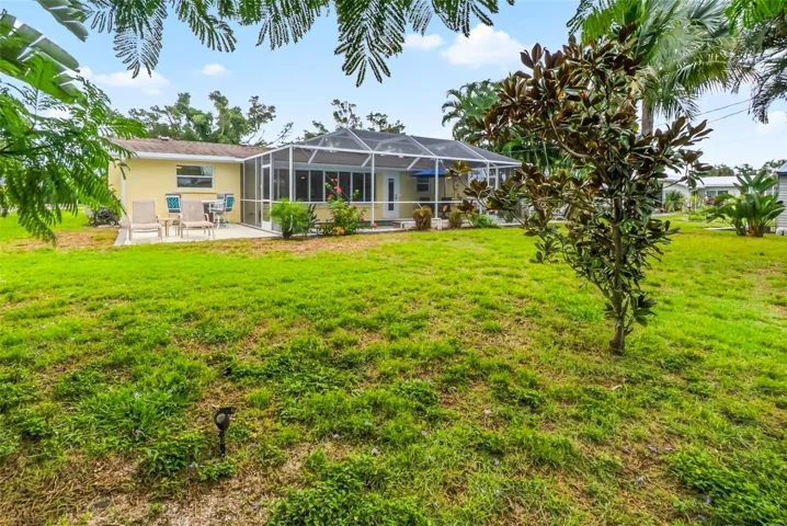 Rear exterior and backyard lawn.