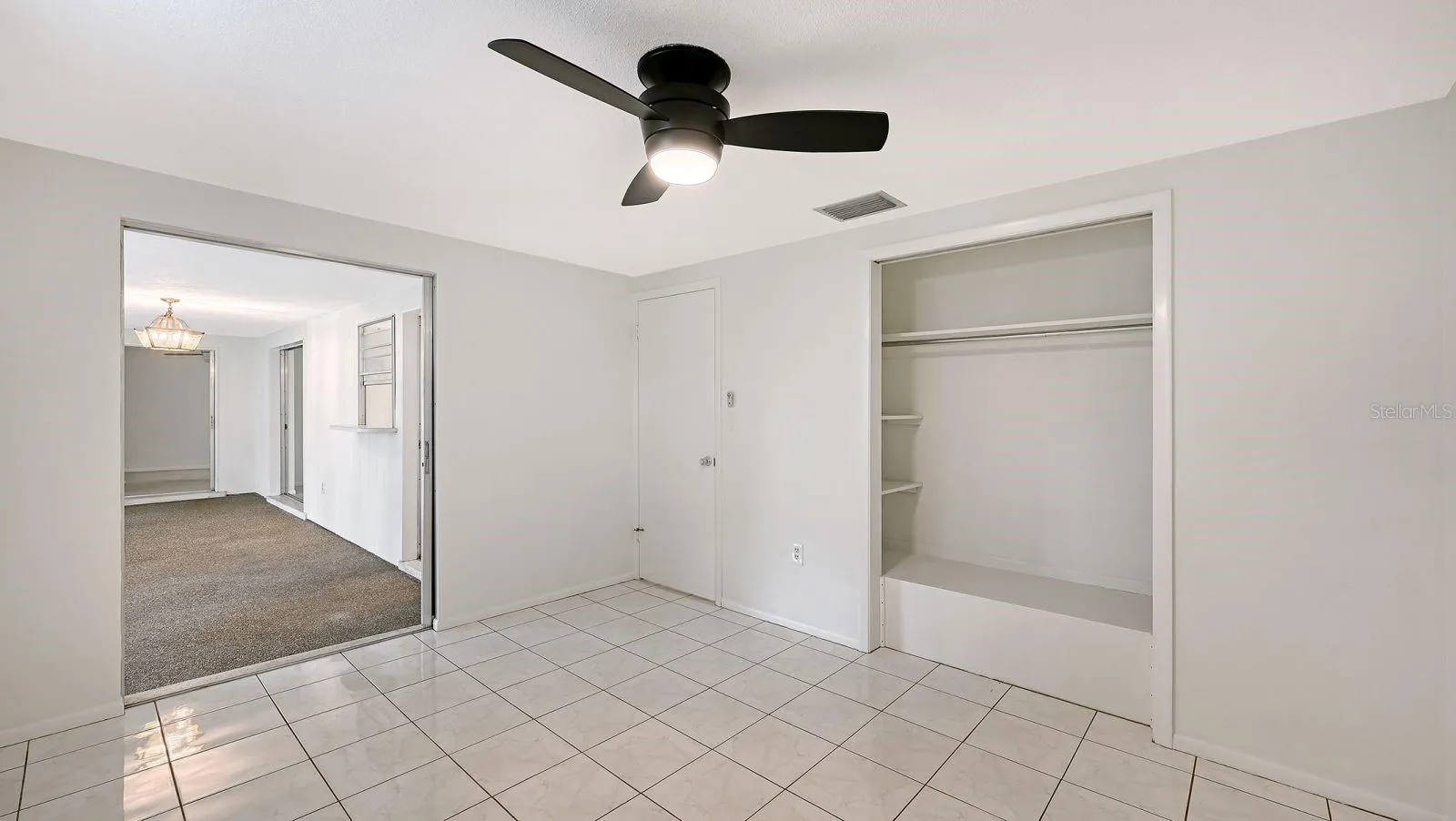 Guest Bedroom with a Slider to the Florida Room