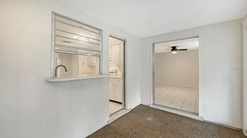 Pass thru window and door from the Kitchen to the Florida Room