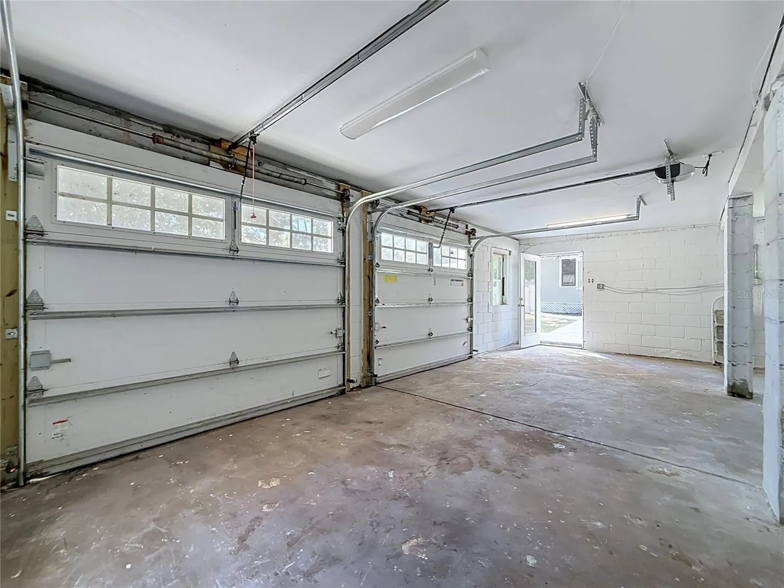Rare DETACHED BLOCK 2-CAR GARAGE with NEW ROOF and ALLEY ACCESS and additional parking! This versatile space offers endless possibilities! Keep it as a traditional 2 car garage, create a WORKSHOP, HOME GYM, ART STUDIO, or PERSONAL HANGOUT, or explore the potential for an ACCESSORY DWELLING UNIT (ADU) for guest accommodations or possible rental income, subject to city approval and permitting