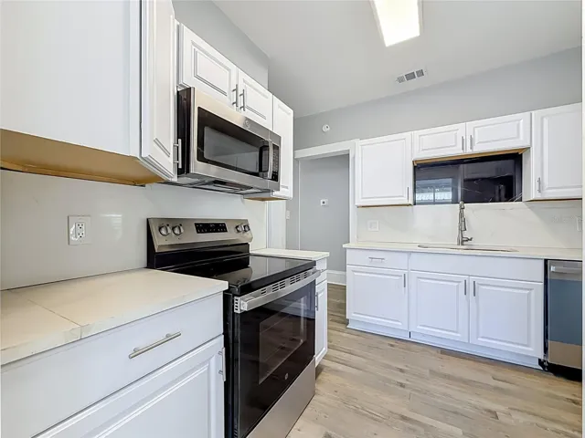 Updated Kitchen with New Stainless Steel Appliances