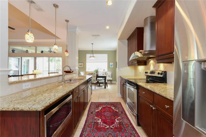Galley Kitchen.  Under counter microwave.