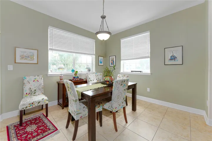 Dining area adjacent to the living room and kitchen