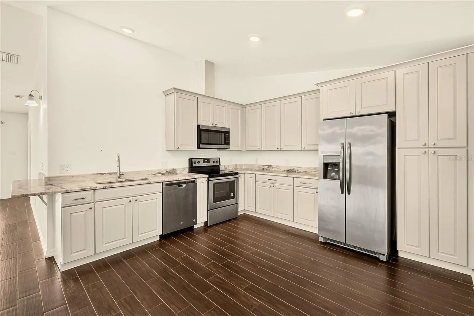 Kitchen has SS appliances