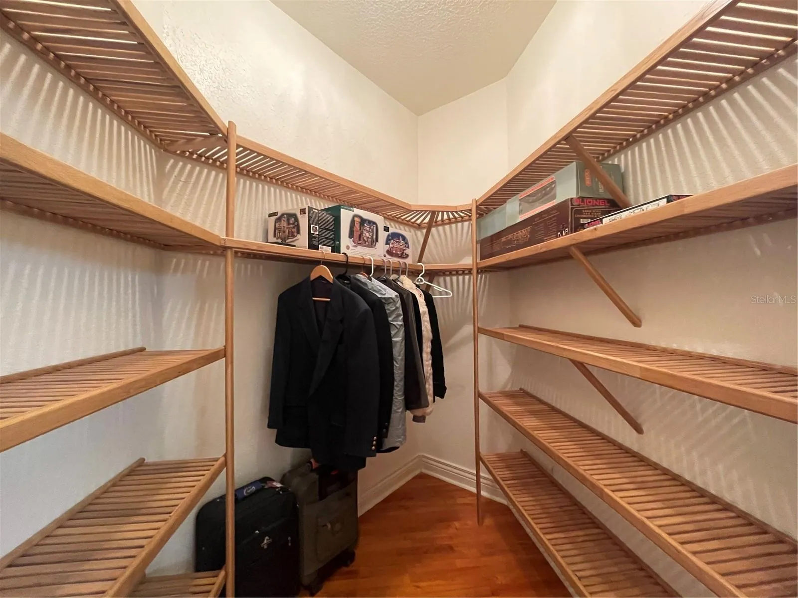 One of two walk in closets in the primary bedroom