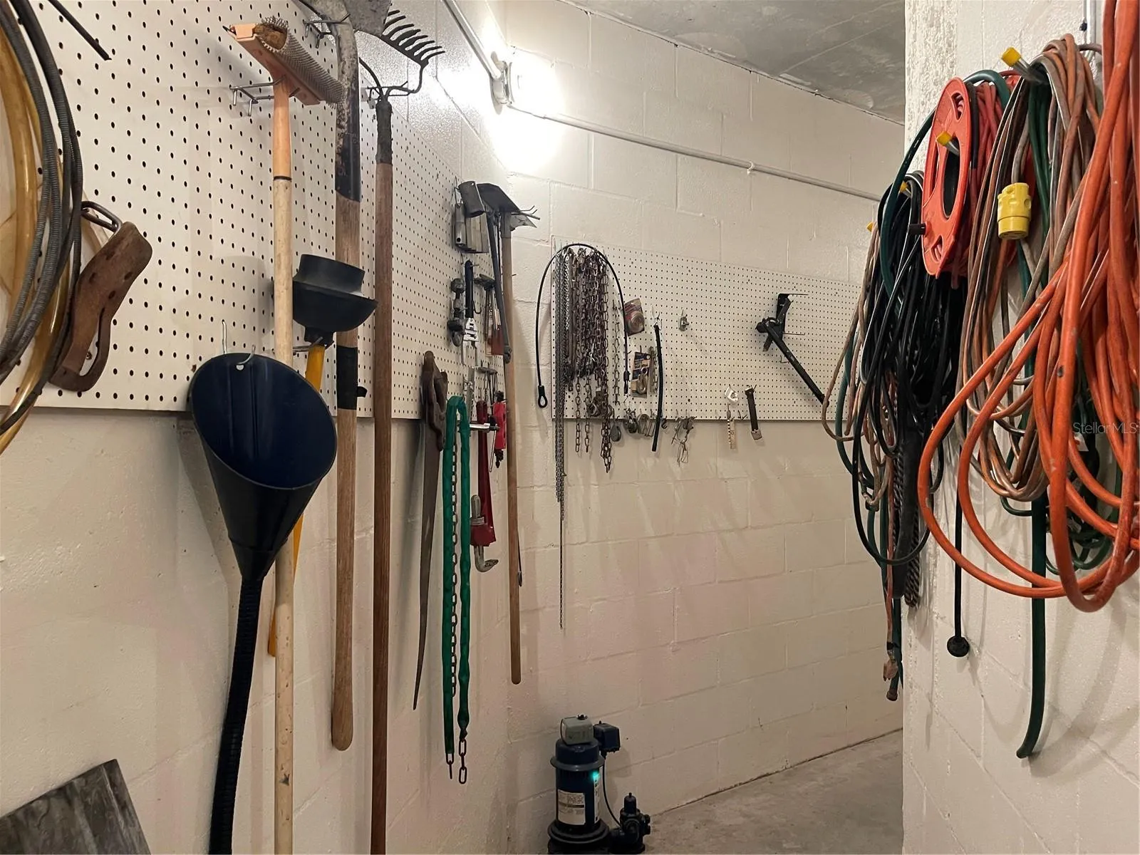 Plenty of hooks and peg board for hanging tools and equipment