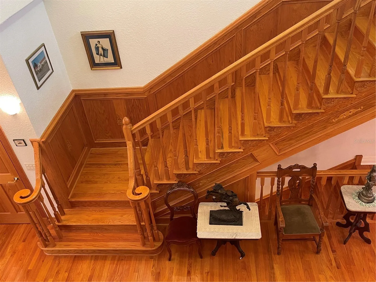 Spindles, volute and banister are all solid wood