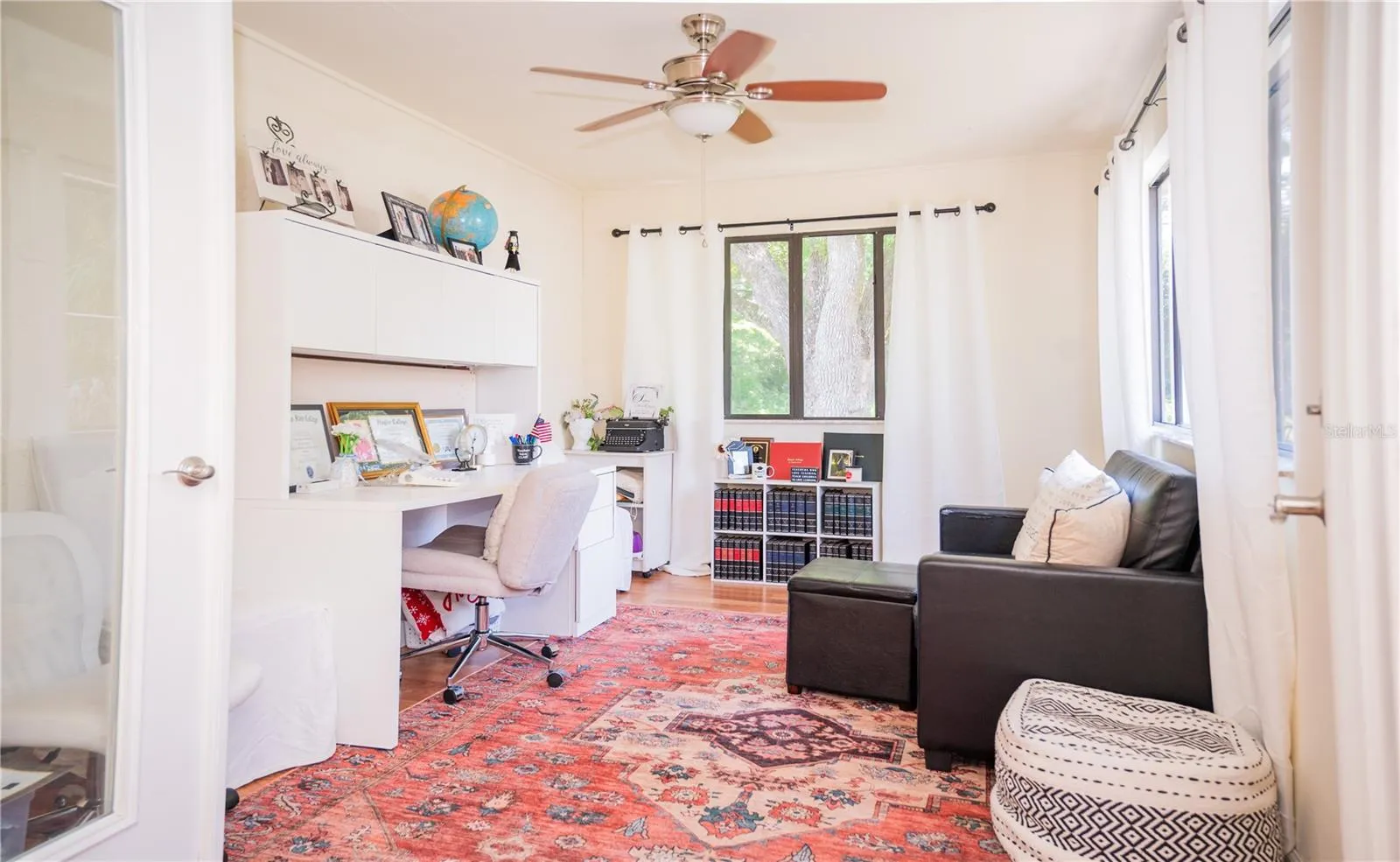 Another view of the spacious home office, perfect for a dedicated workspace or creative studio.