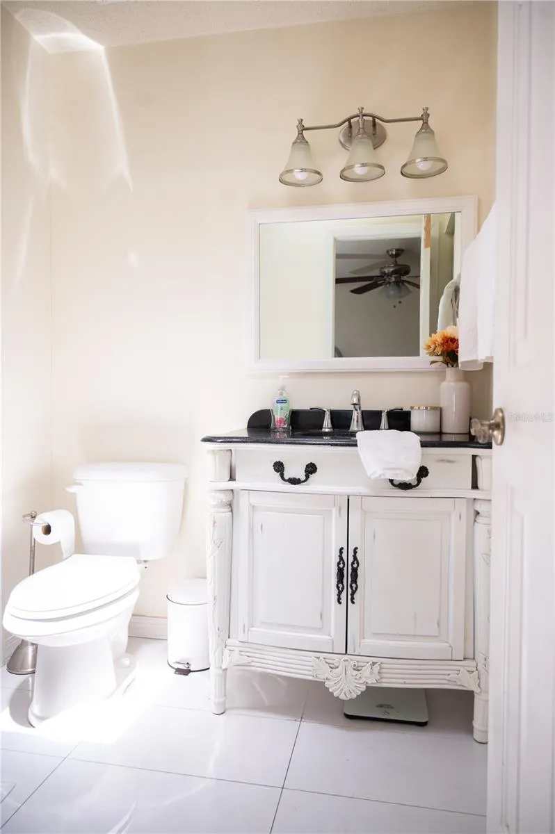 Ensuite primary bathroom with custom cabinetry and premium finishes.