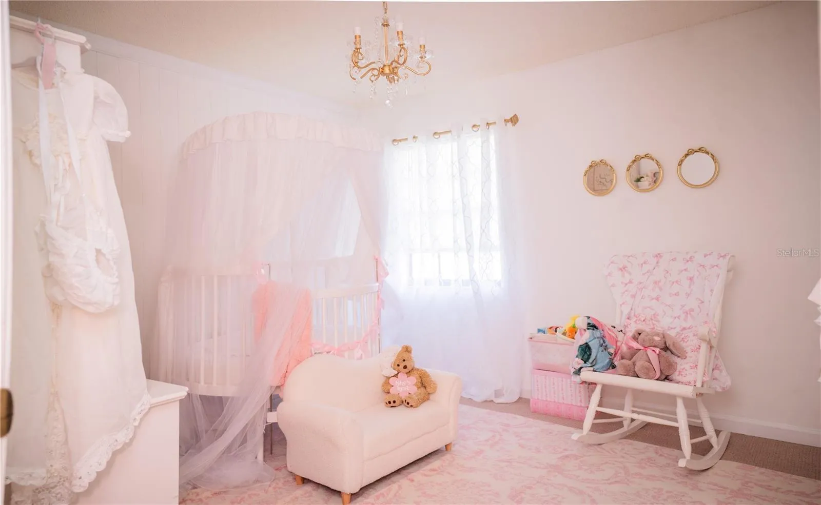 This enchanting second bedroom is currently staged as a serene nursery, but its flexible layout makes it perfect for a home office, gym, studio, or whatever your imagination can create.