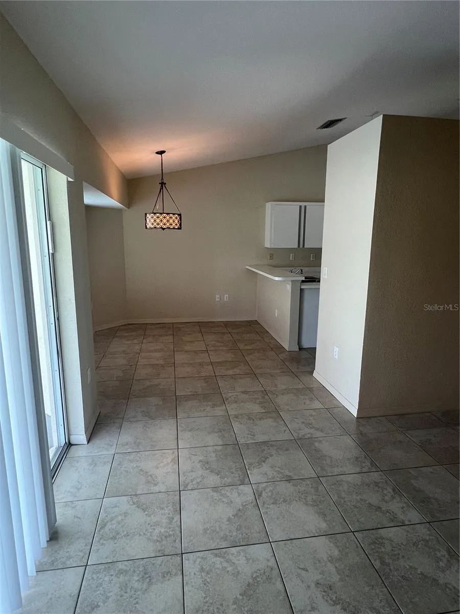 larger view of eat in area off kitchen and great room