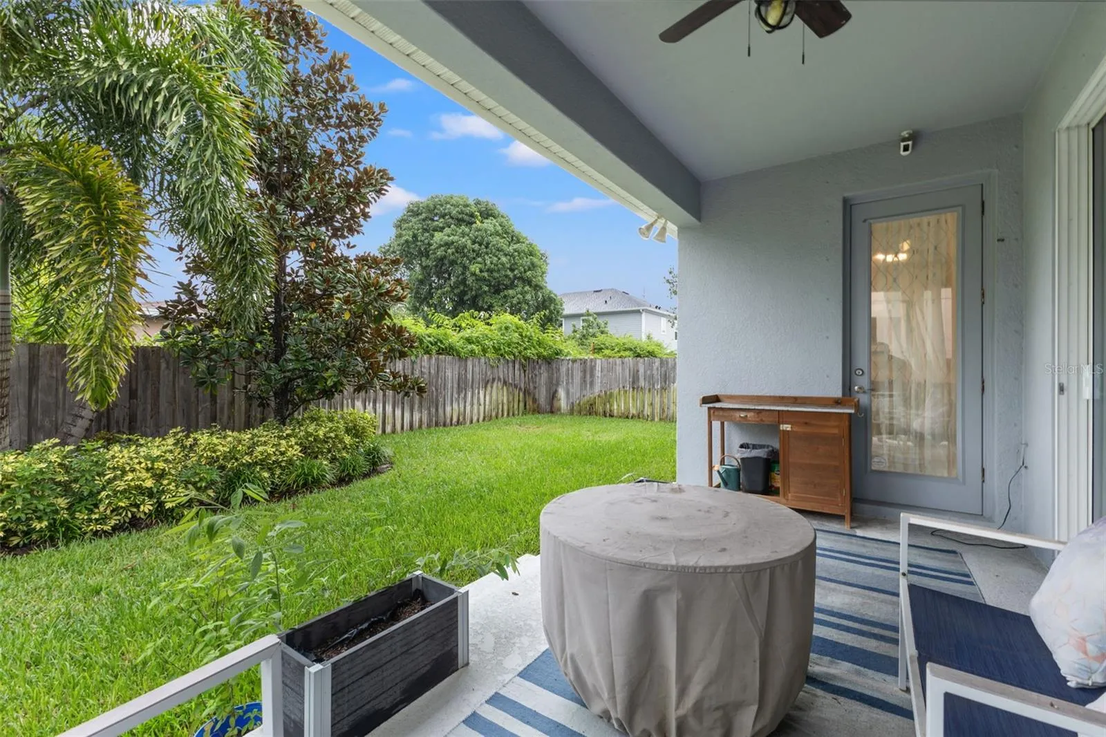 fully fenced tropical backyard