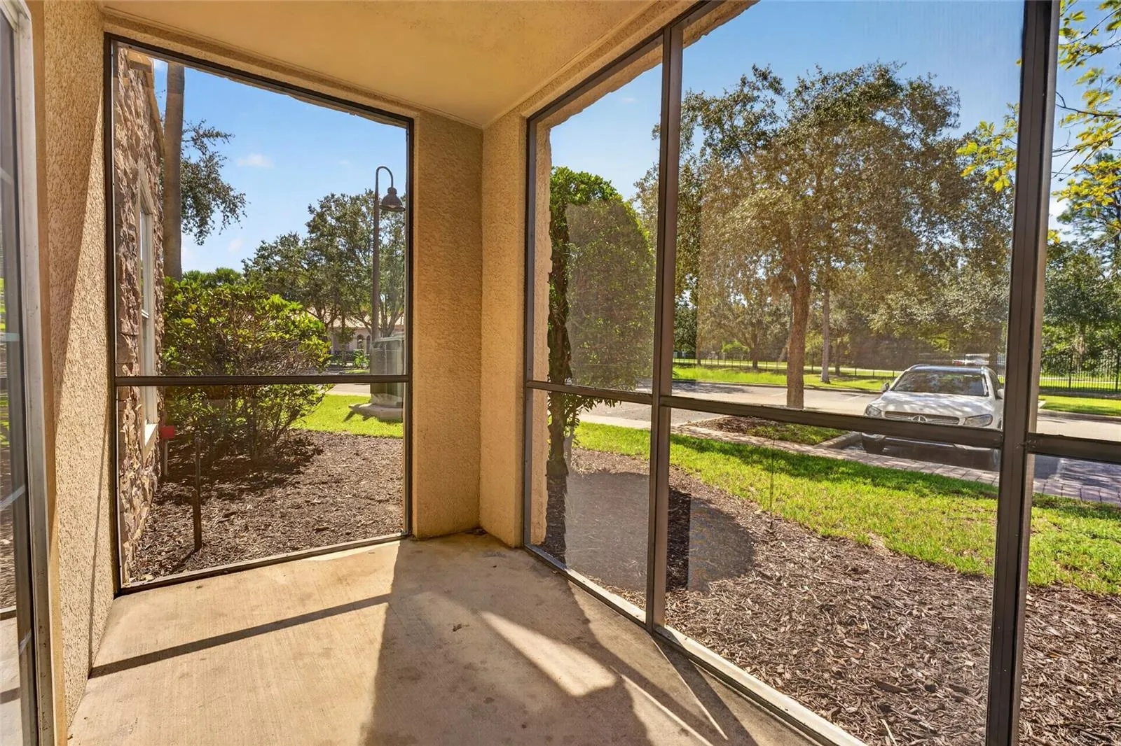 GROUND FLOOR SCREENED PATIO. SW FACING.