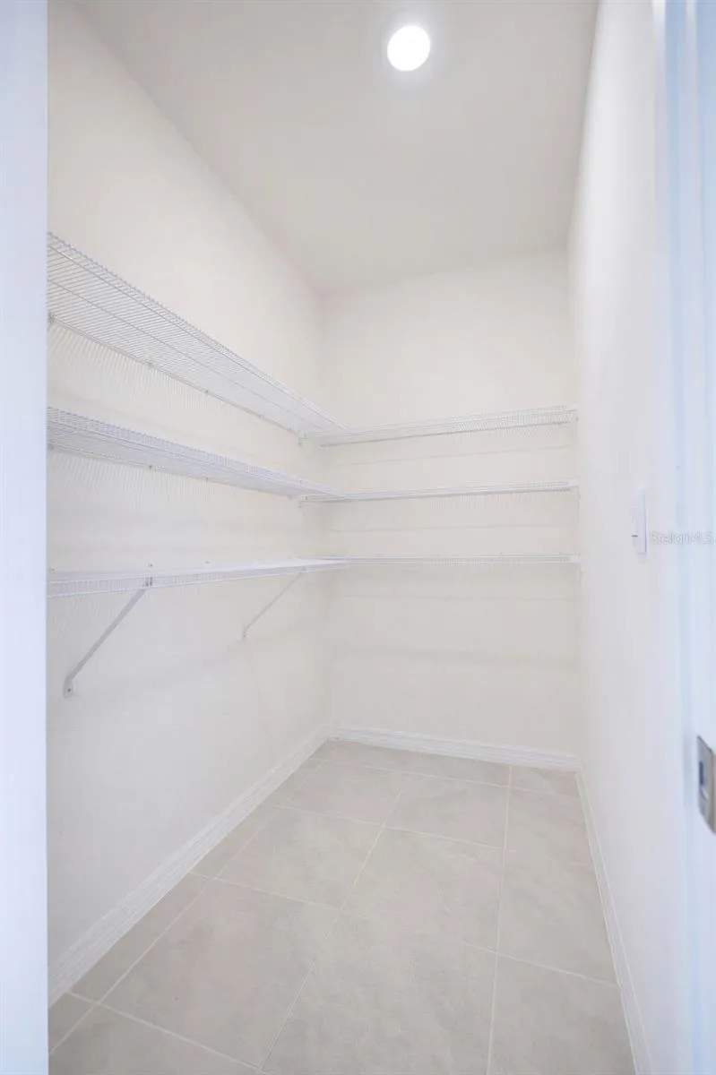 The Kitchen features a Large Walk-in Pantry