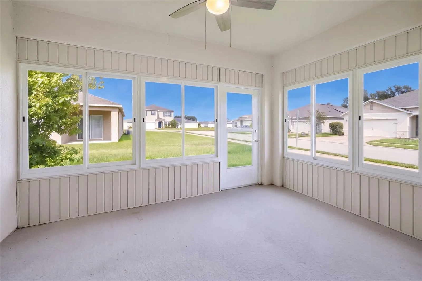 Florida Room features hurricane impact windows &amp; door
