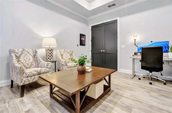 Versatile flex room ideal as a home office, den, or additional guest space.