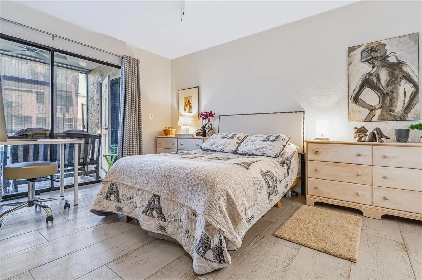 main bedroom with views of porch
